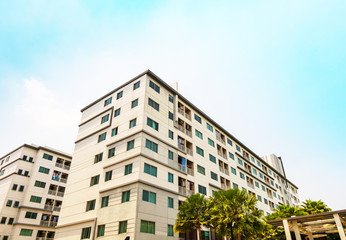 Condominium Building on sky background