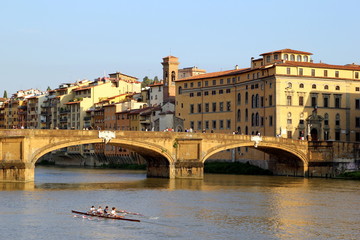 Fototapeta na wymiar Florence, Italy. The view on the bridge and river.