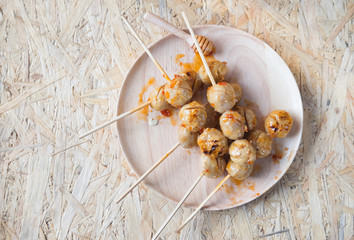 Roasted pork balls with sweet spicy sauce