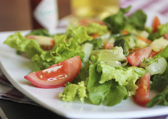 Fresh salad. Tomatoes and lettuce