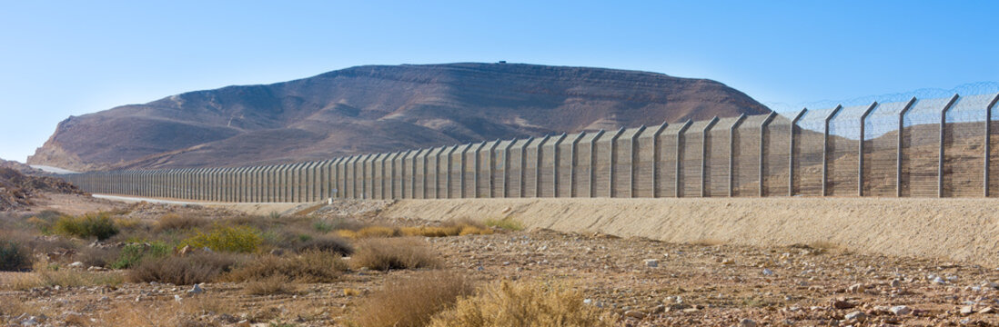 Israel Egypt border fence in the Negev and Sinai deserts