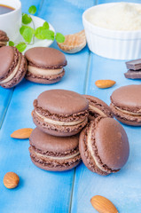 French traditional dessert chocolate macarons with coffee cream