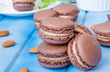 French traditional dessert chocolate macarons with coffee cream