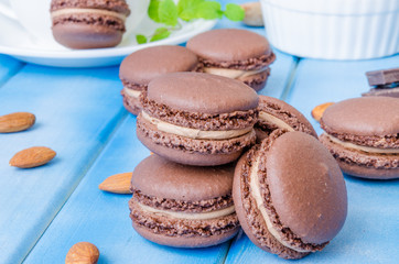 French traditional dessert chocolate macarons with coffee cream
