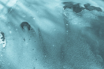 Frozen water of a canal on cold winter day