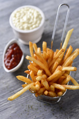 french fries, mayonnaise and ketchup
