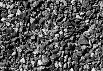 Pile of black and white gravel stones.