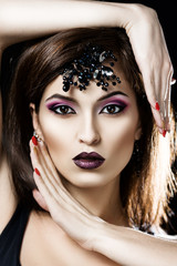 Fototapeta premium portrait of beautiful girl with jewelry