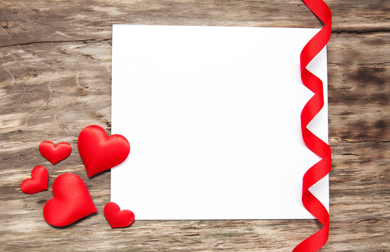 Greeting card with red hearts