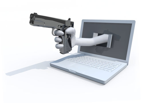 hand with a pistol put out from a notebook