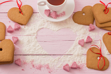 cookies heart on pink wooden background