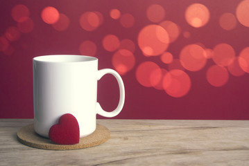 white mug and heart