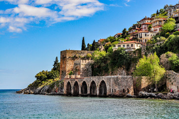 Dockyard and arsenal in Alanya on a beautiful, sunny day, Turkey - obrazy, fototapety, plakaty