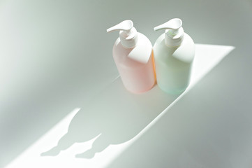 plastic pump for liquid soap, without labels, on a white background