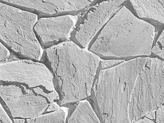 White color cracked real stone wall