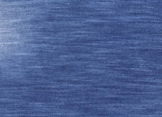 Dark blue denim textile texture.