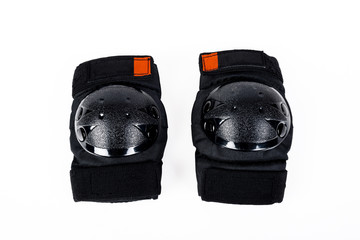 Protectors for knees and elbows on white background