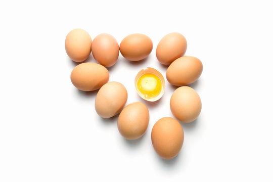 egg on white background with egg is broken