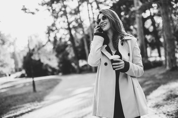 Young woman in the autumn park