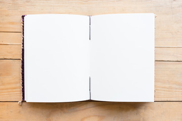 Noteboook paper with copy space on the wood background