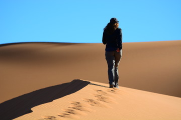 Fototapeta na wymiar Walking in a Desert