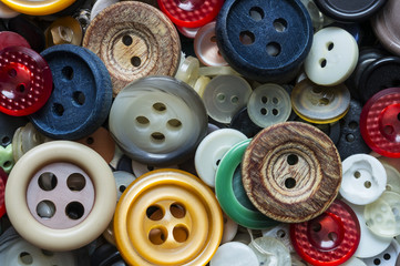 Assorted colored buttons close up