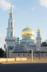 mosque with gold domes against sky