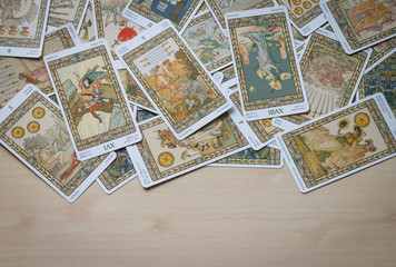 Fototapeta na wymiar Tarot cards on wooden background.
