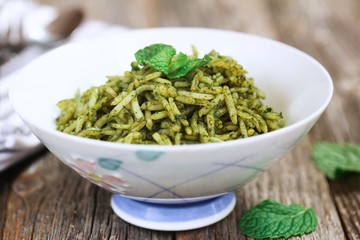 Healthy Mint Rice on wooden background, selective focus