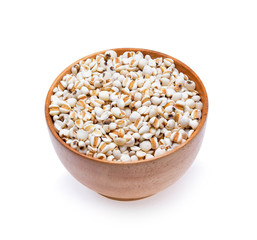 millet grains on white background