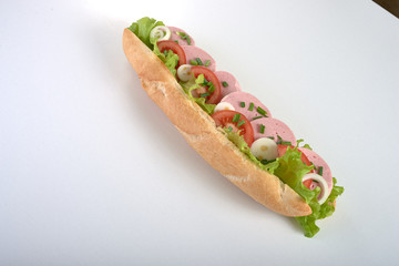 sandwich with sausage and vegetables isolated