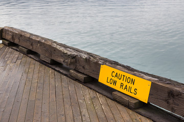 Caution sign in Port of Valdez. Alaska, USA