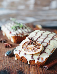 Fruitcake decorated with white and dark chocolate