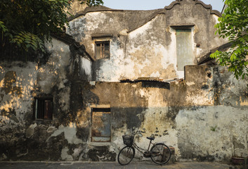 Fototapeta na wymiar A very all wall looking like painting in Hoi An ancient town, UNESCO world heritage. Hoi An is one of the most popular destinations in Vietnam