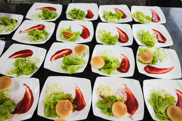 Dishes with round bread, salad, sauce and appetizer. Healthy food