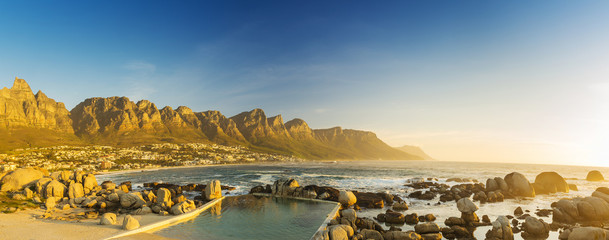 Sunset Panorama Of Camps Bay In South Africa
