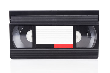 Black video cassette on the white background