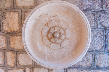 Medieval age wall decor made of stone.