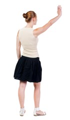 Back view of beautiful woman welcomes.