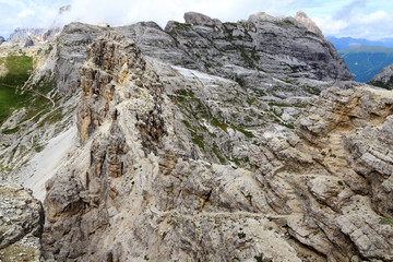 Steps at via ferrata Alpinisteig and Sexten Dolomites mountain panorama in South Tyrol, Italy