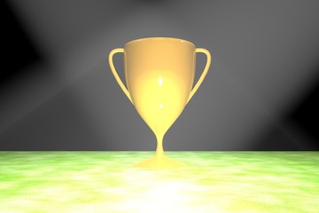 Golden cup over grass field
