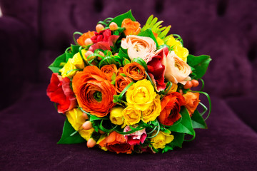 Fototapeta na wymiar Colorful bridal bouquet of flowers
