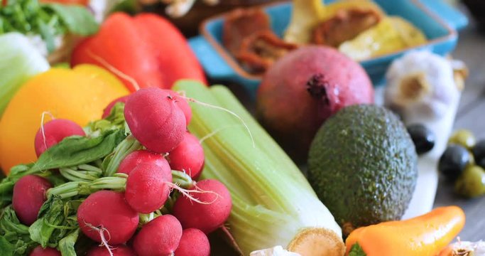 Dolly close up push in view of fresh, healthy, organic ingredients for salad