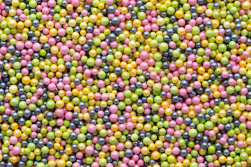 Multicoloured sweet sugar balls. Small ball pattern.