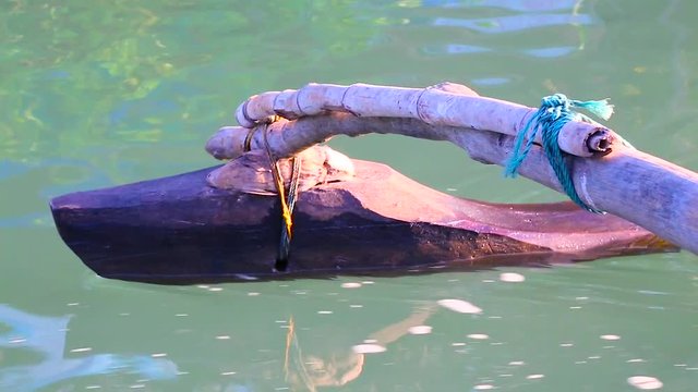 Sailing with a pirogue on indian river, Goa, India