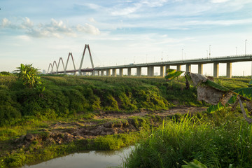 Nhat Tan bridge viewing from wild land on Red River riverbed