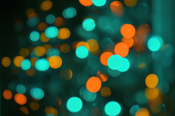 Defocus multicolored lights blur bokeh abstract background.