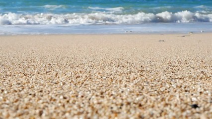 Beautiful sand beach and sea waves on sunny day slow motion - Powered by Adobe