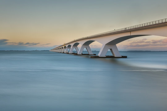 long exposure photo of Zeeland bridge at sunset