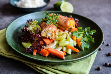 Roasted turkey breasts rolls stuffed with egg, Feta cheese, pepper and parsley, served with rice and steamed vegetable